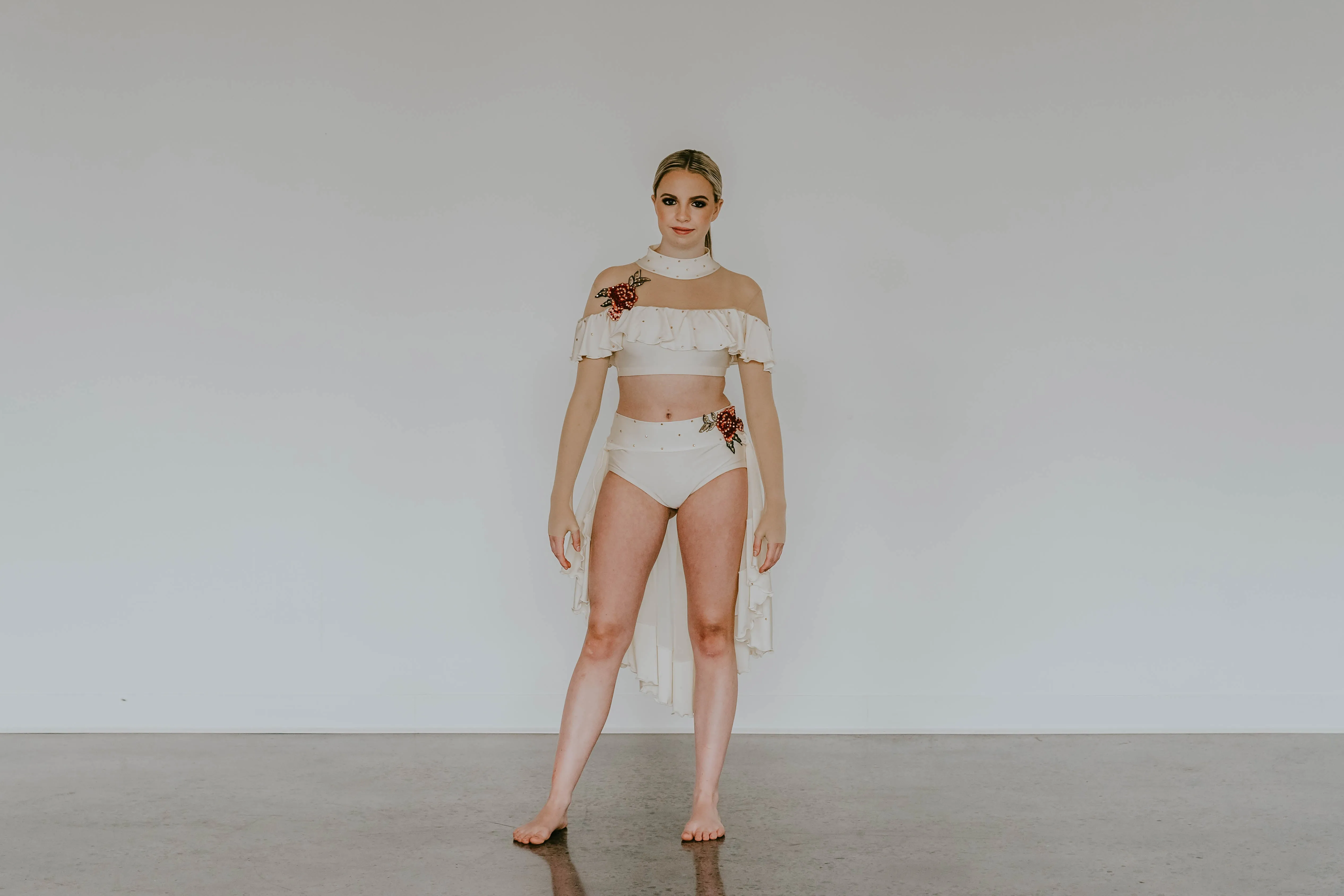 Ivory Lycra and Sheer Mesh 2 pc Long Sleeve Top and Trunk/Half Skirt - Rhinestones